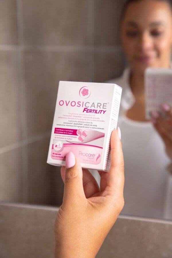 Woman looking at Ovosicare Fertility and PCOS supplement