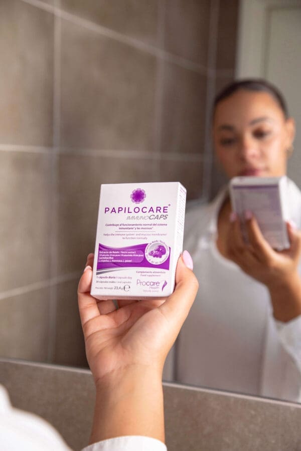 Woman using papilocare immunocaps